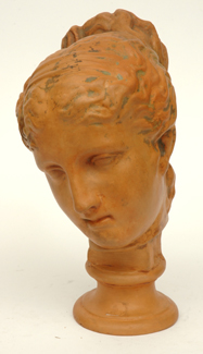 Appraisal: A CLASSICAL STYLE TERRACOTTA BUST OF A WOMAN cm high