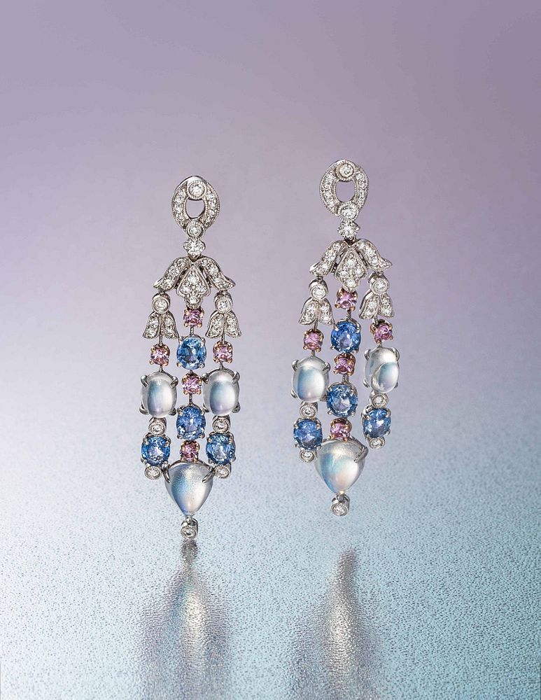 Appraisal: DIAMOND MOONSTONE AND SAPPHIRE EARCLIPS DIAMOND MOONSTONE AND SAPPHIRE EARCLIPS