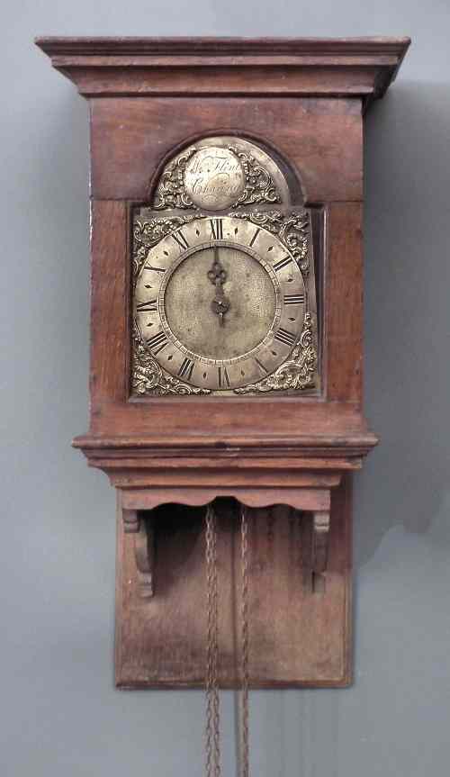 Appraisal: An unusual th Century oak cased hooded wall clock by