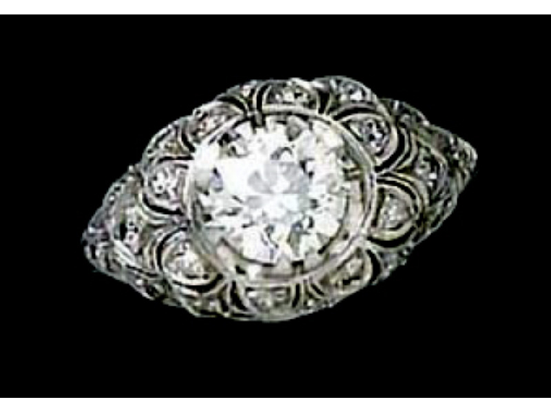 Appraisal: DIAMOND RING Platinum lady's ring with beaded border trim set