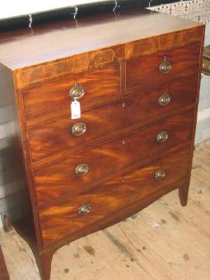 Appraisal: A GEORGE III MAHOGANY CHEST of two short and three