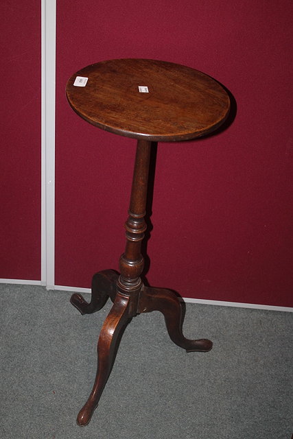 Appraisal: A TH CENTURY MAHOGANY WINE TABLE on turned column and