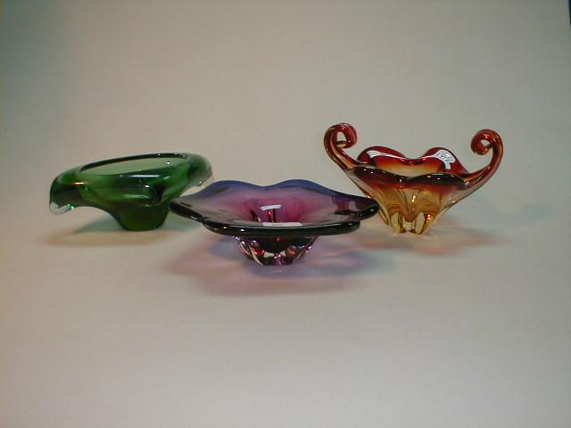 Appraisal: Three Bohemian glass bowls abstract shapes various colours