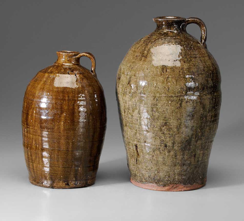 Appraisal: Two Stoneware Jugs one with rounded shoulders and runny dark