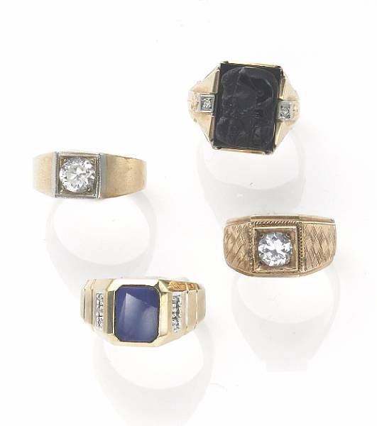 Appraisal: A collection of six gem-set and gold rings with one