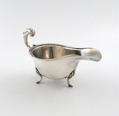 Appraisal: A modern silver sauceboat by Deakin Francis Birmingham plain body