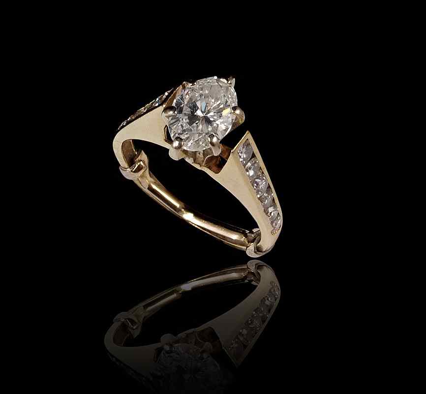 Appraisal: CTW OVAL DIAMOND RING K yellow gold ring centers one