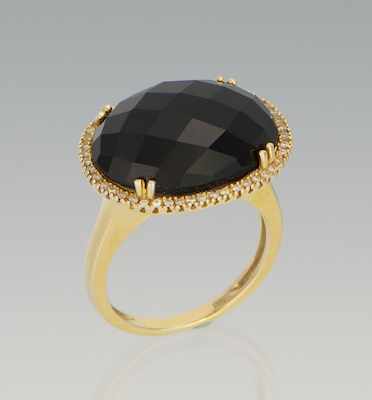 Appraisal: A Ladies' Onyx and Diamond Ring k yellow gold ring