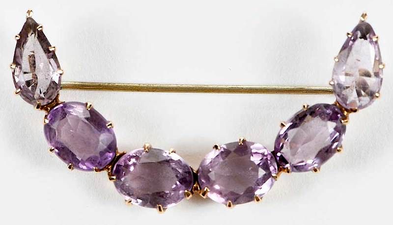 Appraisal: Gold and Amethyst Crescent Brooch four oval faceted and two