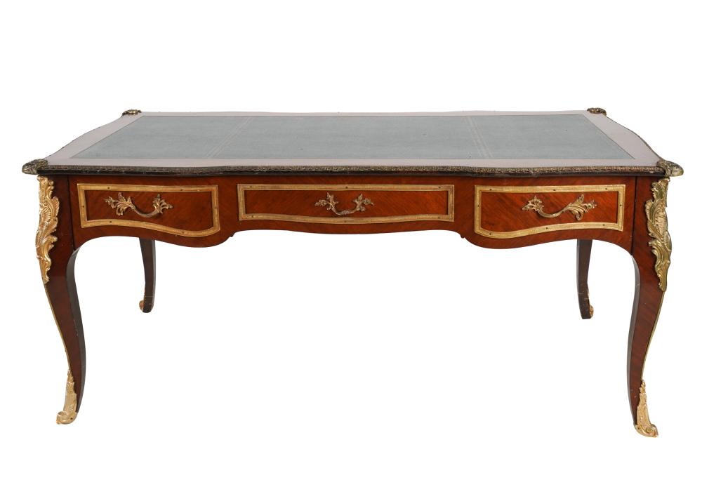 Appraisal: GILT METAL-MOUNTED BUREAU PLATwith three frieze drawers cabriole legs and