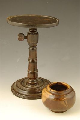 Appraisal: A th century turned rosewood candle stand with an adjustable