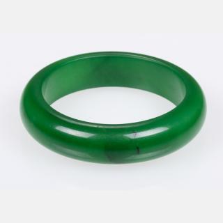 Appraisal: A Green Jade Bangle Bracelet A Green Jade Bangle Bracelet