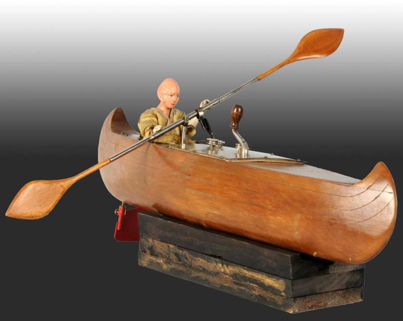 Appraisal: French Auto-Rameur Clockwork Rowboat Toy Description Man rows in realistic