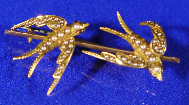 Appraisal: Unmarked Victorian gold and pearl swallow brooch