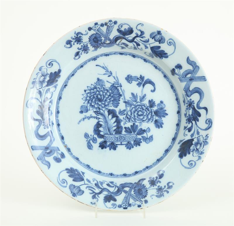 Appraisal: DUTCH BLUE AND WHITE DELFT CHARGER Unmarked centering a flower-filled