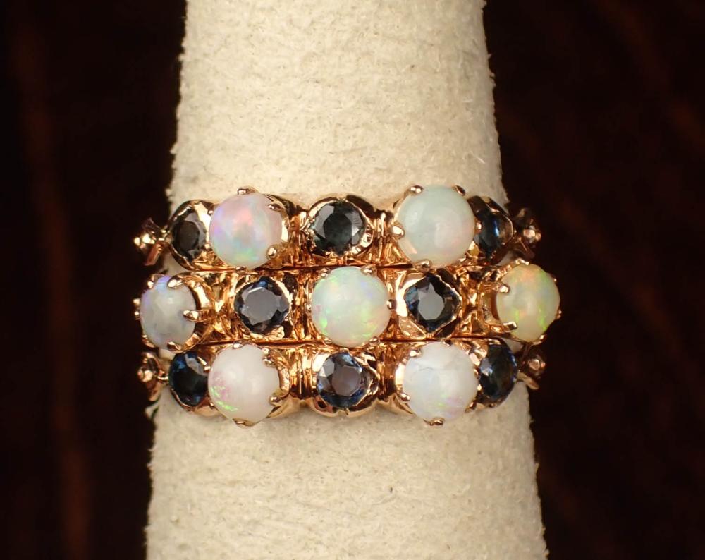 Appraisal: OPAL SAPPHIRE AND FOURTEEN KARAT GOLD RING with three connected