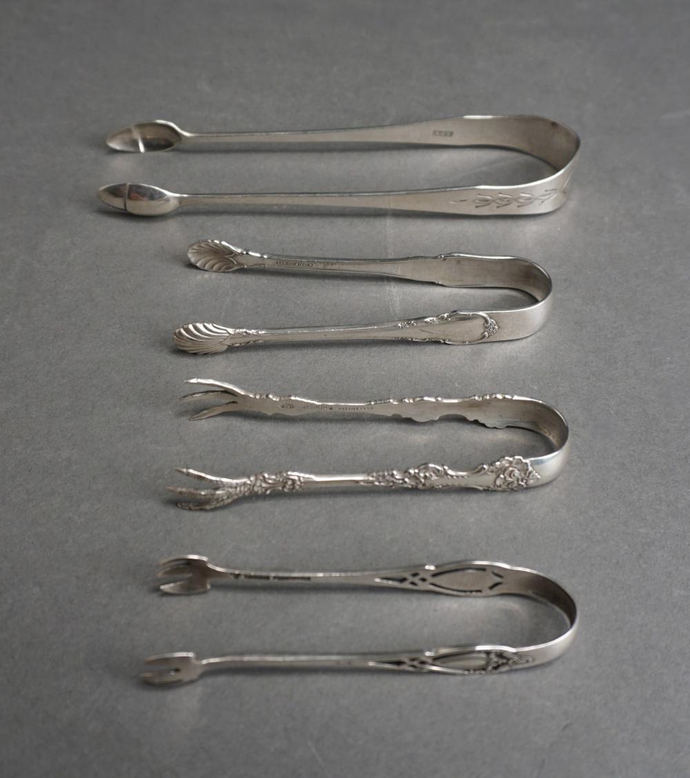 Appraisal: THREE STERLING AND ONE COIN SILVER SUGAR TONGS OZTThree Sterling