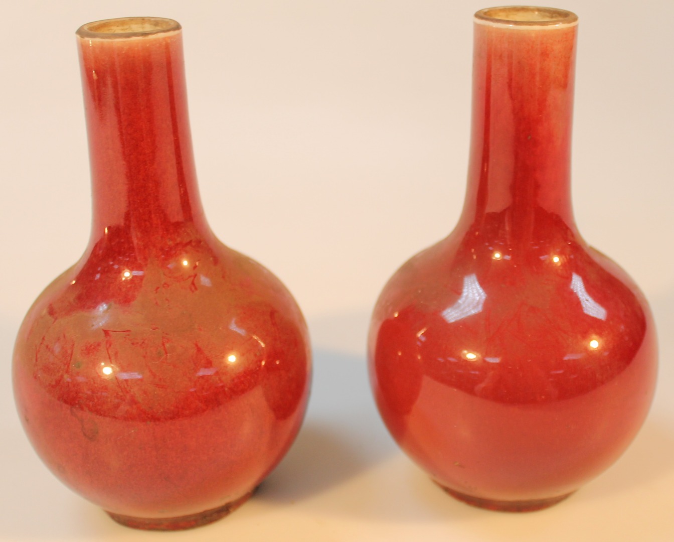 Appraisal: A pair of Chinese earthenware sang de boeuf vases each