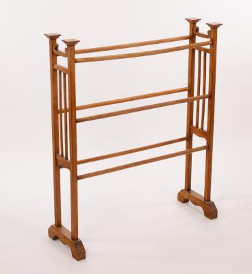 Appraisal: An Arts Crafts oak towel rail cm wide