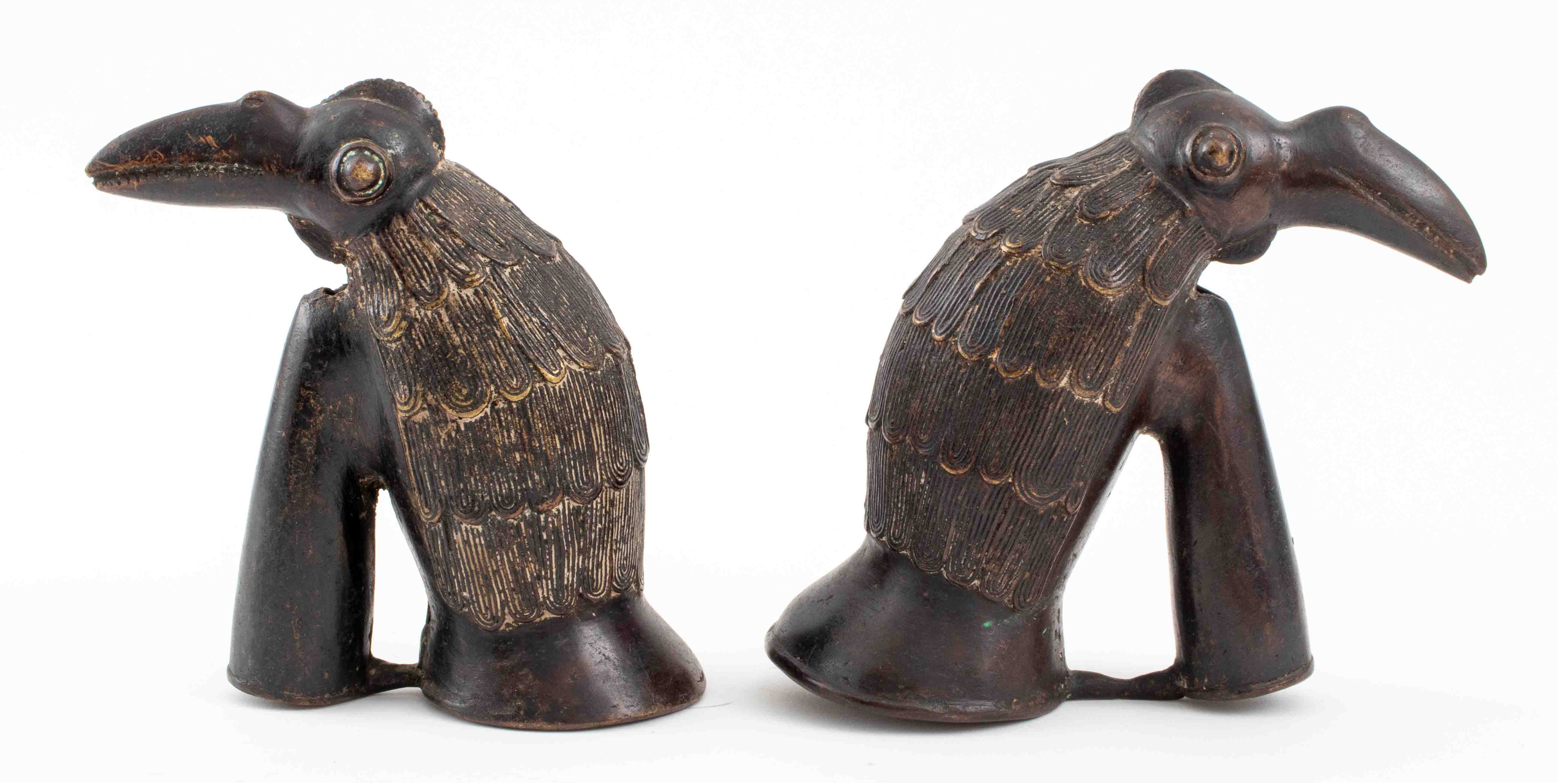 Appraisal: BENIN BRONZE STYLE BIRD SCULPTURES Two African Benin bronze style