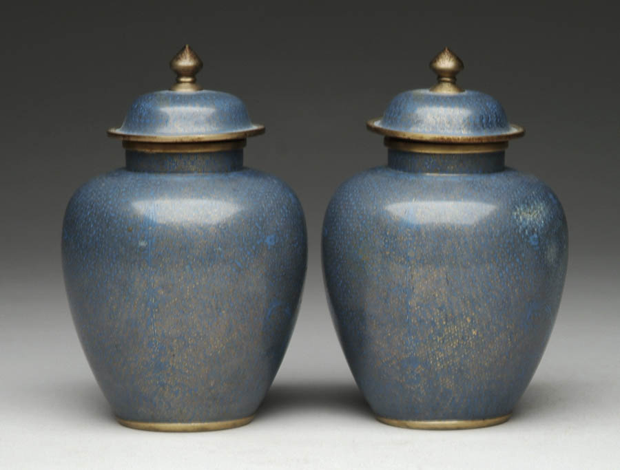 Appraisal: PAIR OF COVERED CLOISONN GINGER JARS Domed covers with pointed