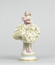 Appraisal: Dresden Porcelain Ballerina Figurine Ballerina porcelain figurine with ruffled skirt