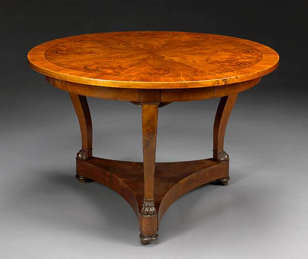 Appraisal: An Empire crossbanded walnut and mahogany dining table first quarter