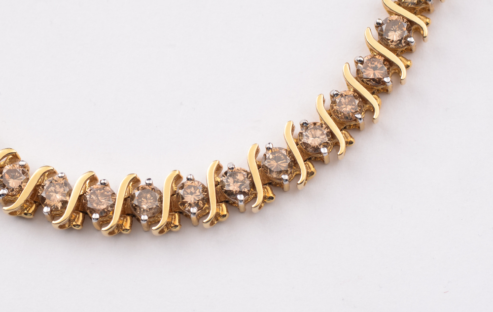 Appraisal: DIAMOND TENNIS BRACELET k yellow gold S link diamond bracelet