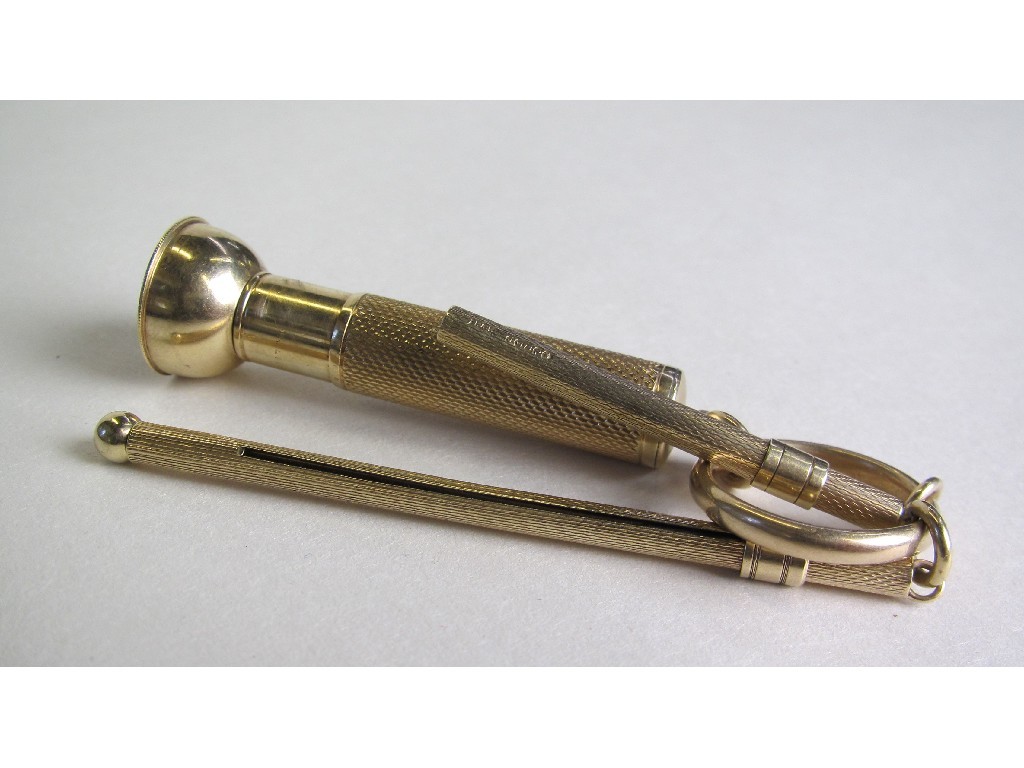 Appraisal: George V ct gold swizzle stick cigar cutter and toothpick