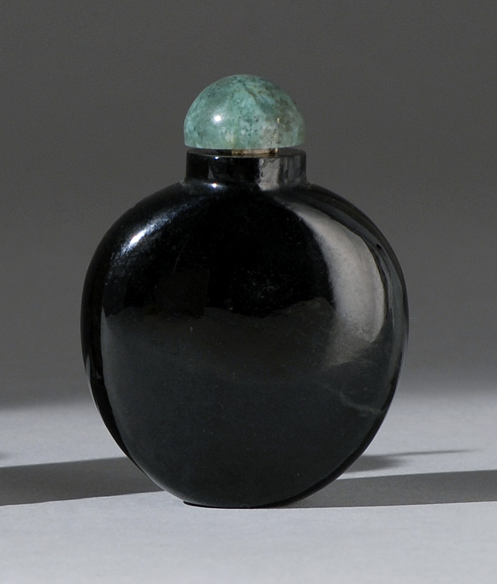 Appraisal: BLACK JADE SNUFF BOTTLE In flattened ovoid form Height cm