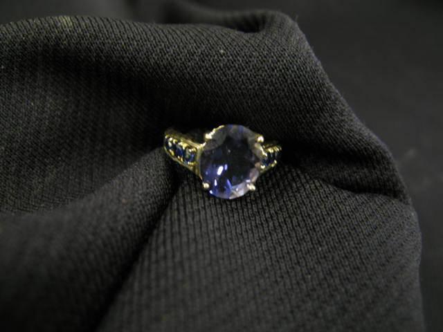 Appraisal: Iolite Ring deep rich gems totaling carats in k yellow