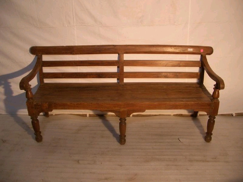 Appraisal: A large teak Garden Bench with slatted design ft