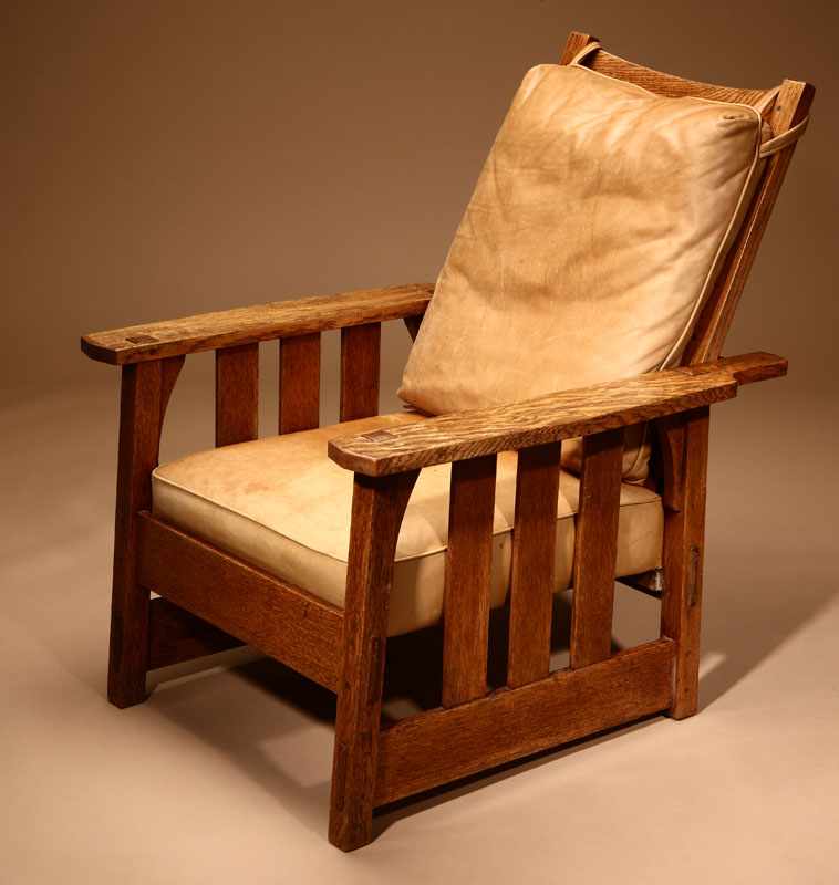 Appraisal: A Gustav Stickley oak Morris chair Circa apparently unmarked the