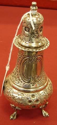 Appraisal: Hand chased floral repousse footed shaker troy oz S