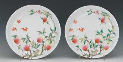 Appraisal: A Pair of Chinese Porcelain Peach Plates Famille Rose enamel