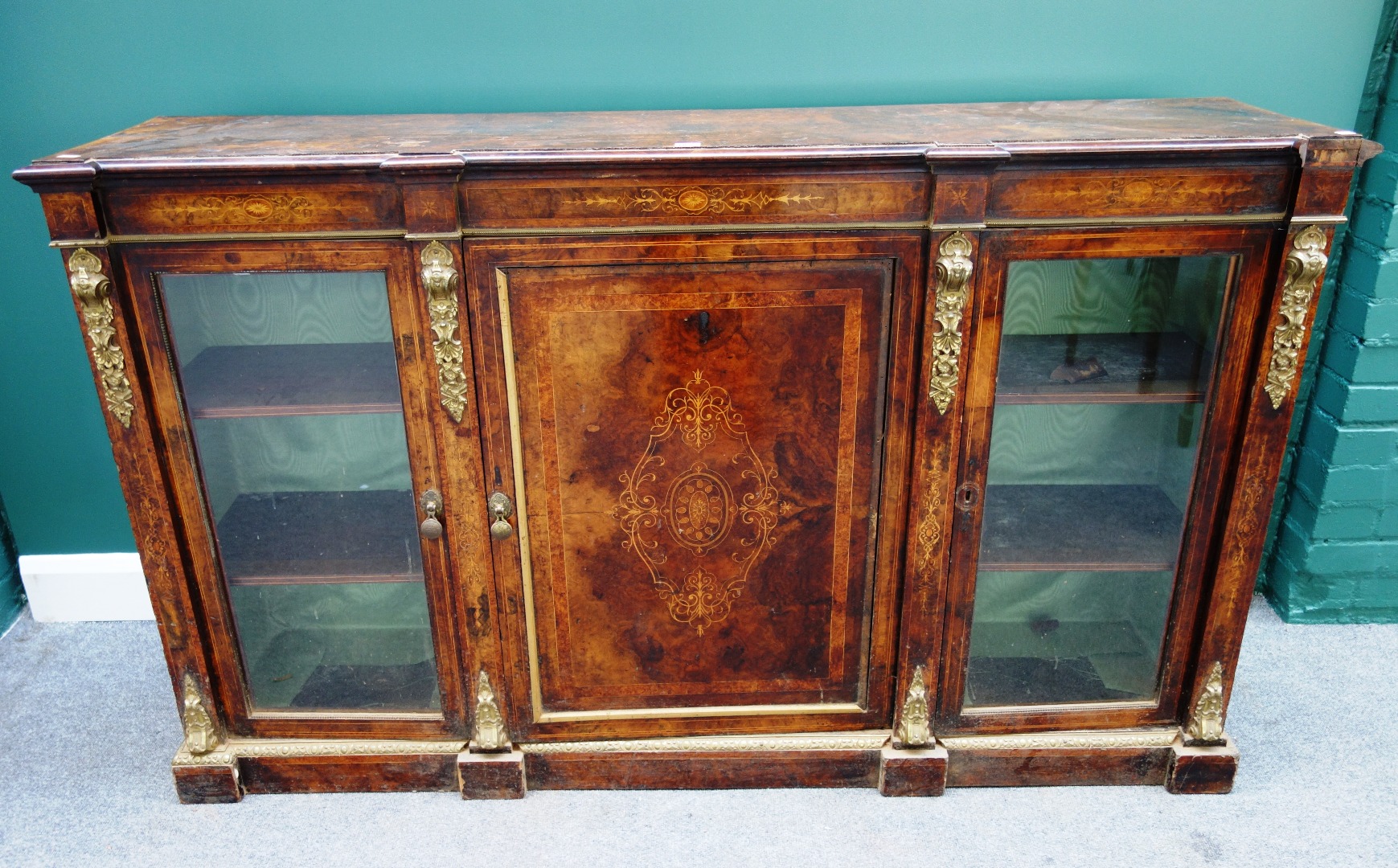 Appraisal: A Victorian gilt metal mounted figured walnut marquetry inlaid side