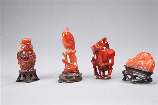 Appraisal: FOUR ASIAN STONE CARVINGS All from various red stone Parrot