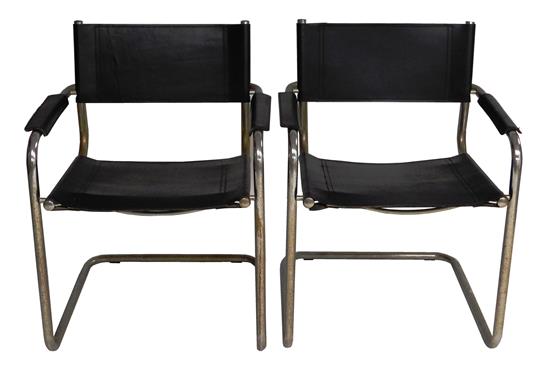 Appraisal: Pair of black leather sling armchairs chrome bases E A