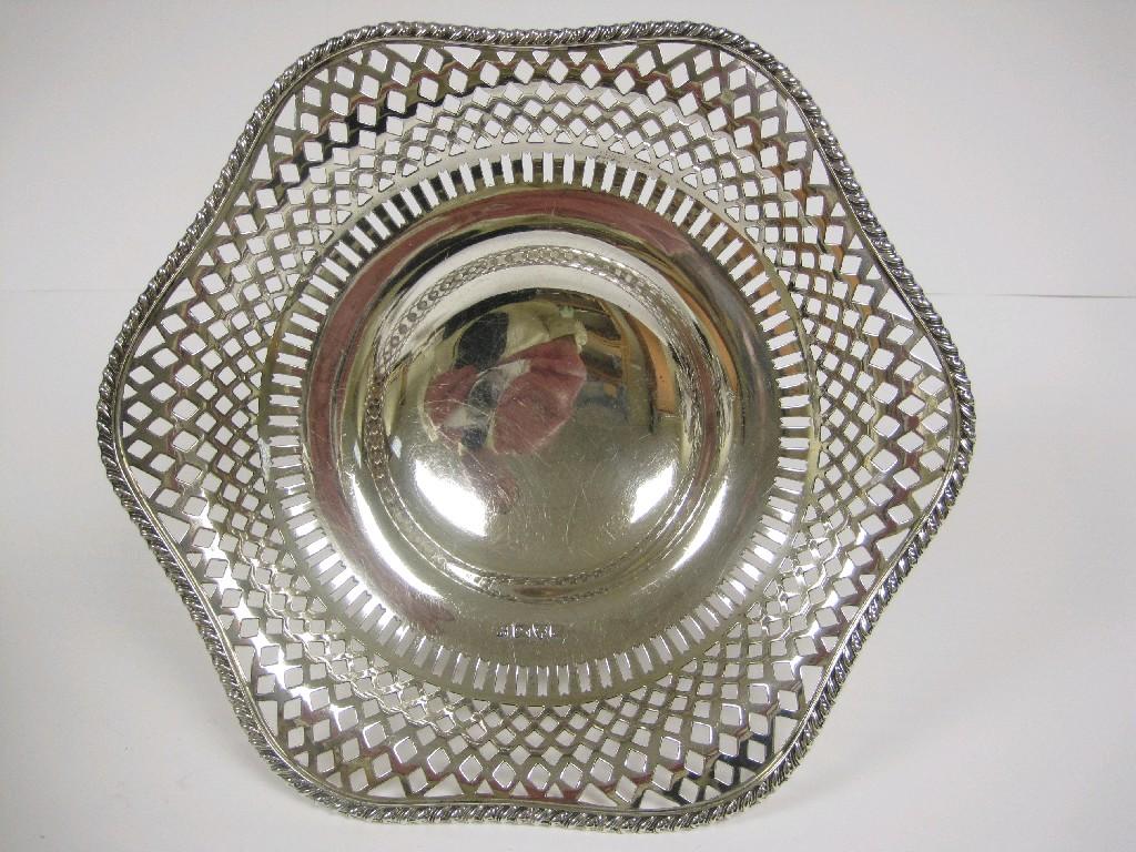 Appraisal: A George V pierced circular Cake Basket with gadroon rim