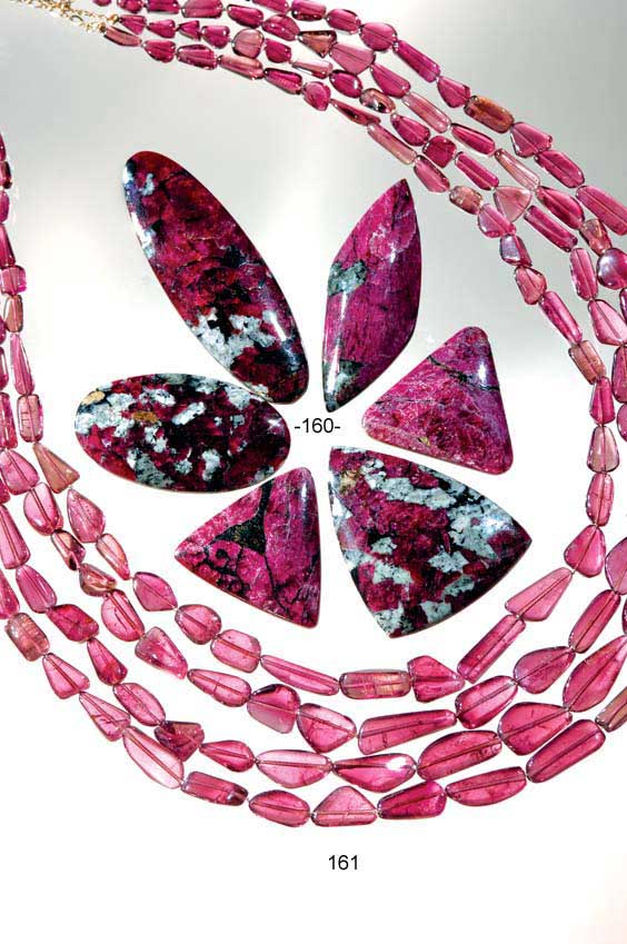 Appraisal: RUBY RED EUDYALITE SUITE Russia Eudyalite is found in the