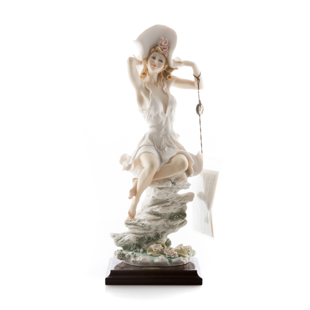 Appraisal: Giuseppe Armani resin figure modeled as a young woman in