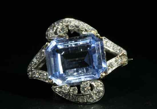 Appraisal: PLATINUM DIAMOND AND AQUAMARINE PIN Emerald-cut aquamarine weighing approx -