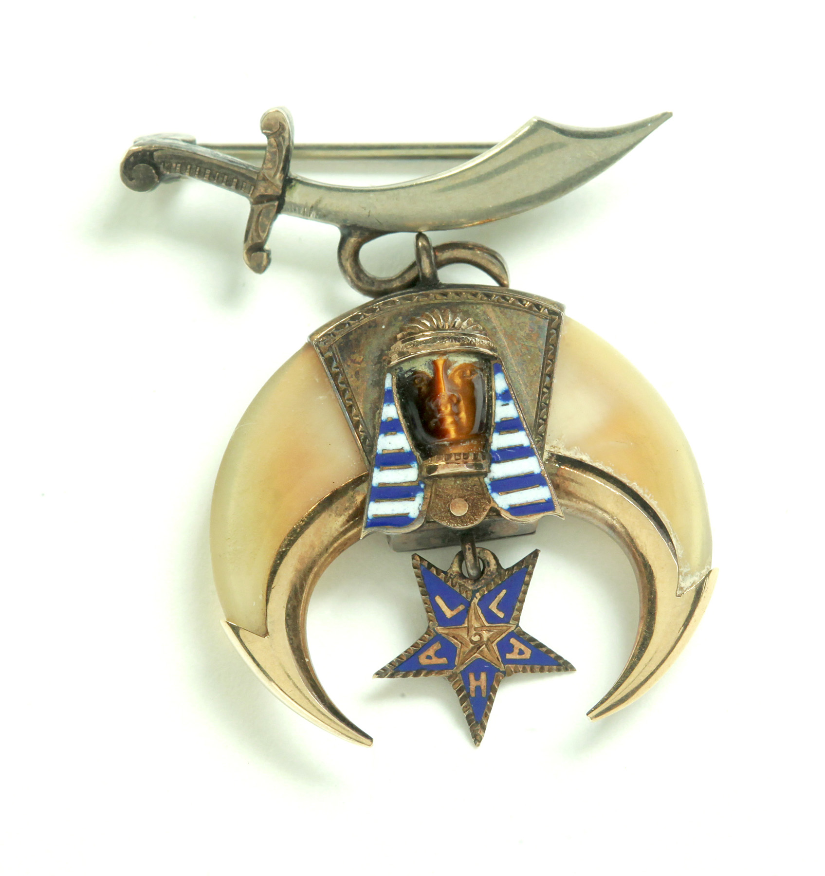 Appraisal: MASONIC FOB American th century Egyptian Revival bear claw pin