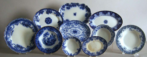 Appraisal: Ten pieces of flow blue to include bowls small plates