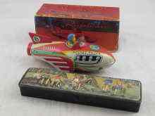 Appraisal: A tinplate '' Rocket Racer '' with friction motor and