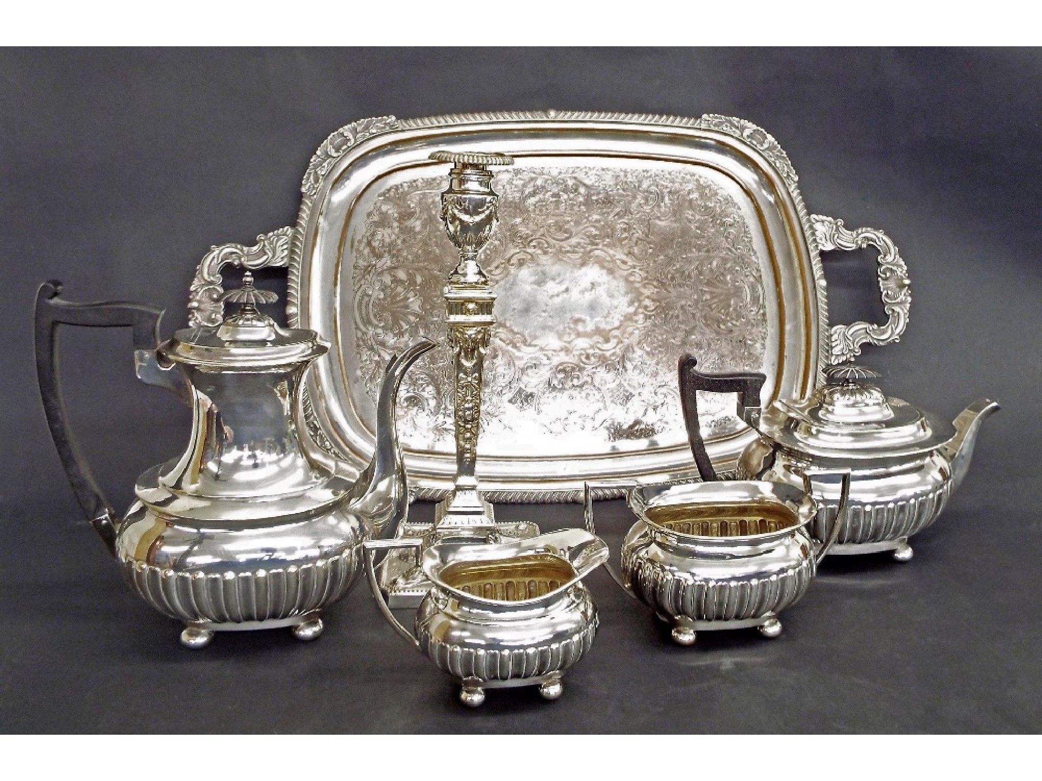 Appraisal: Walker Hall four piece silver plated boat shaped tea service