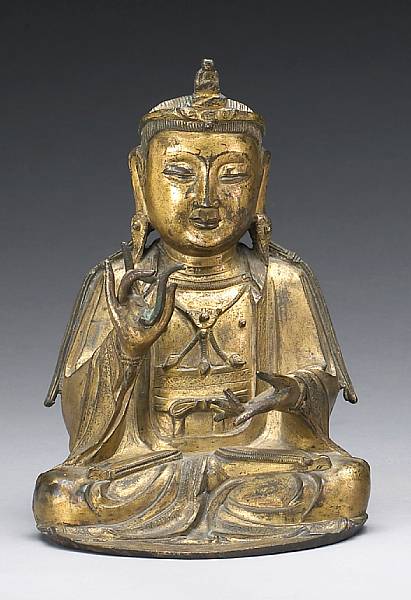 Appraisal: A seated gilt bronze Guanyin Ming Dynasty Seated dhyanasana dressed