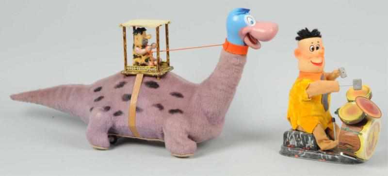 Appraisal: Lot of Flintstones Battery-Op Toys Japanese Toys are a combination