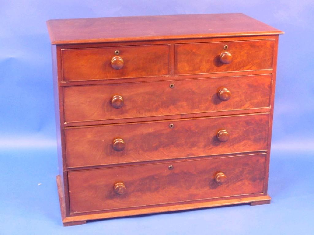 Appraisal: An early thC mahogany chest of two short and three