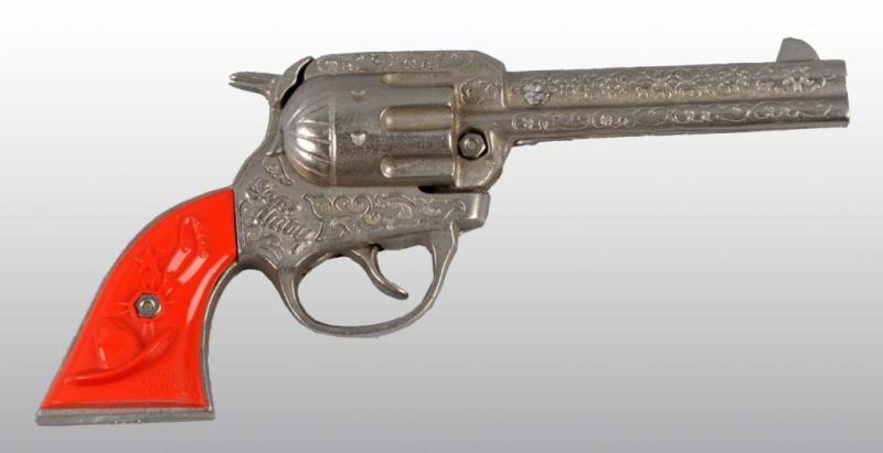 Appraisal: Cast Iron Gene Autry Toy Cap Gun Description Engraving on